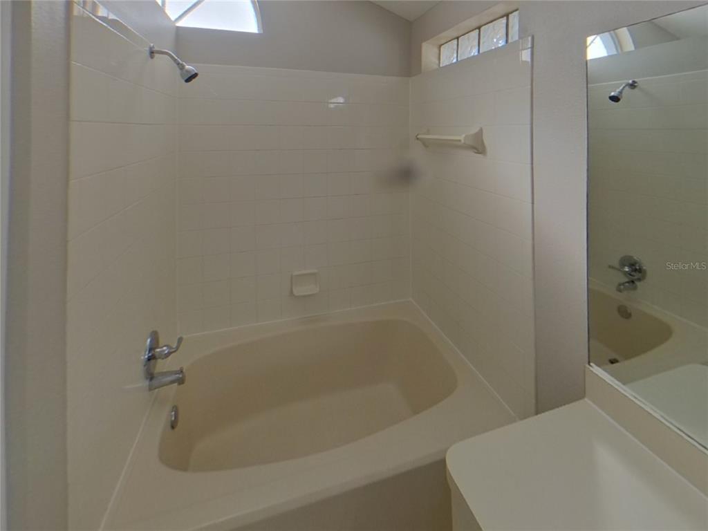 Undisclosed Address Riverview, FL 33578 - Photo 7 of 15 a close view of a bathtub in bathroom