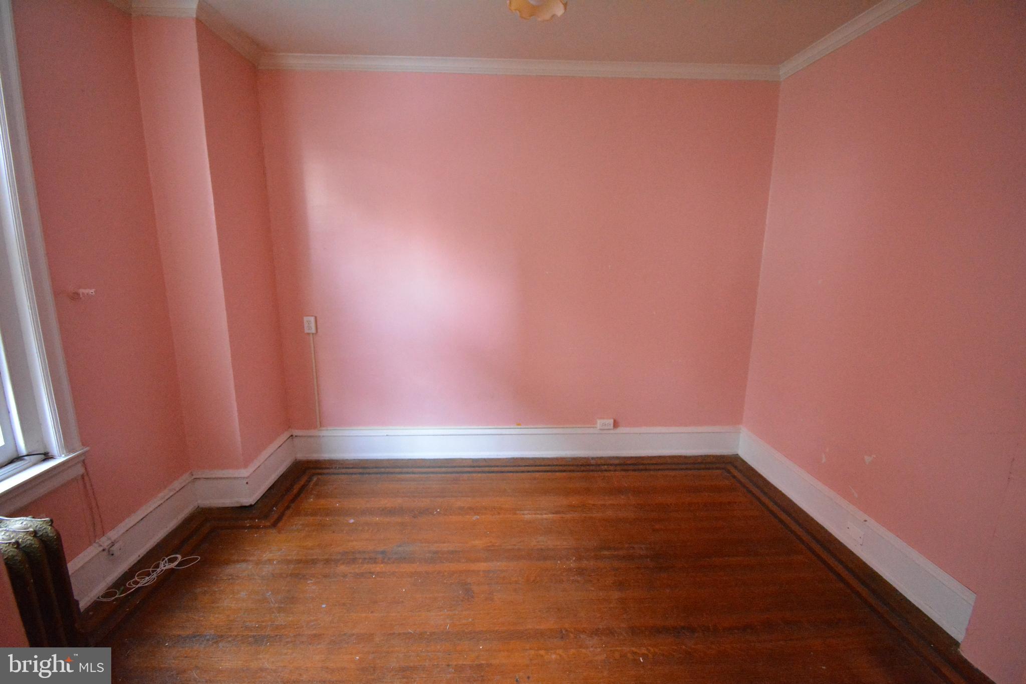 102 Manheim Street, Unit 2 Philadelphia, PA 19144 - Photo 4 of 13 a view of room with window and hardwood floor