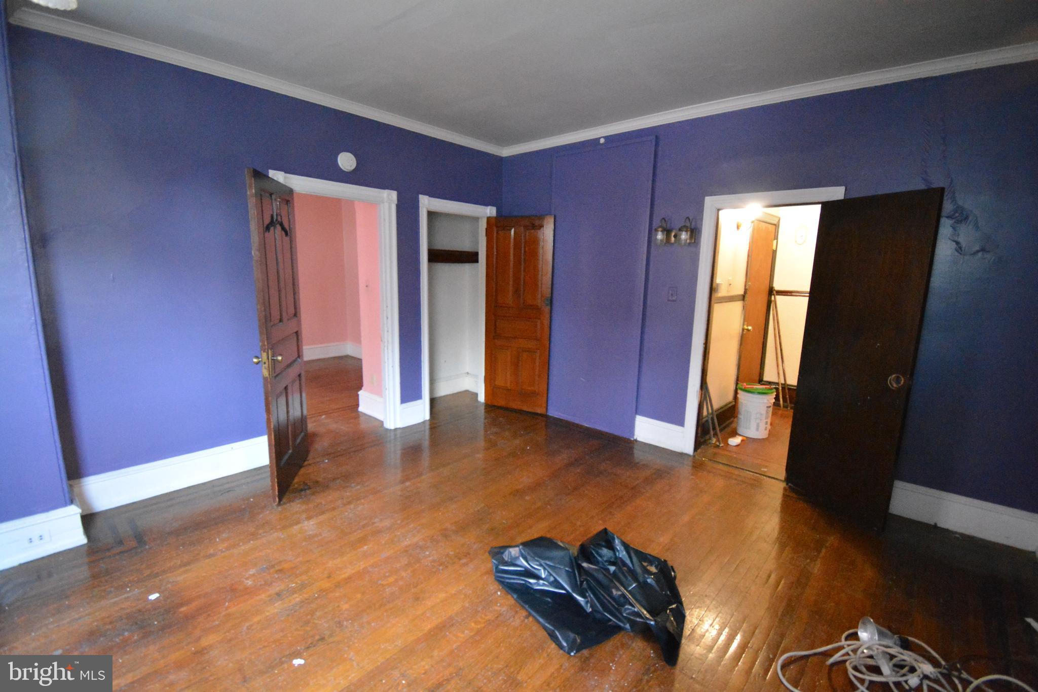 102 Manheim Street, Unit 2 Philadelphia, PA 19144 - Photo 6 of 13 a living room with furniture and a window