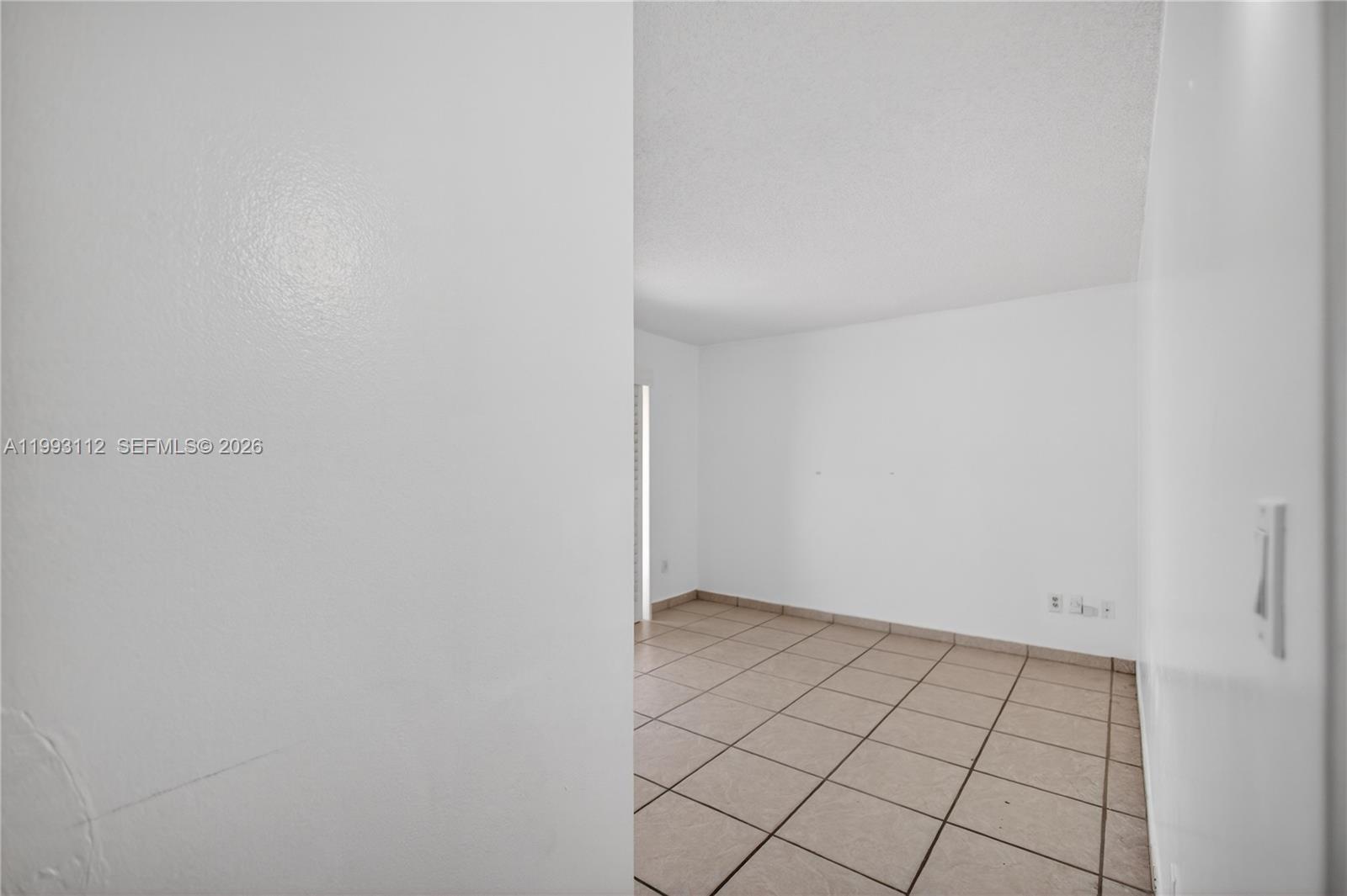 13471 Southwest 99th Terrace Miami, FL 33186 - Photo 31 of 44 a view of an empty room