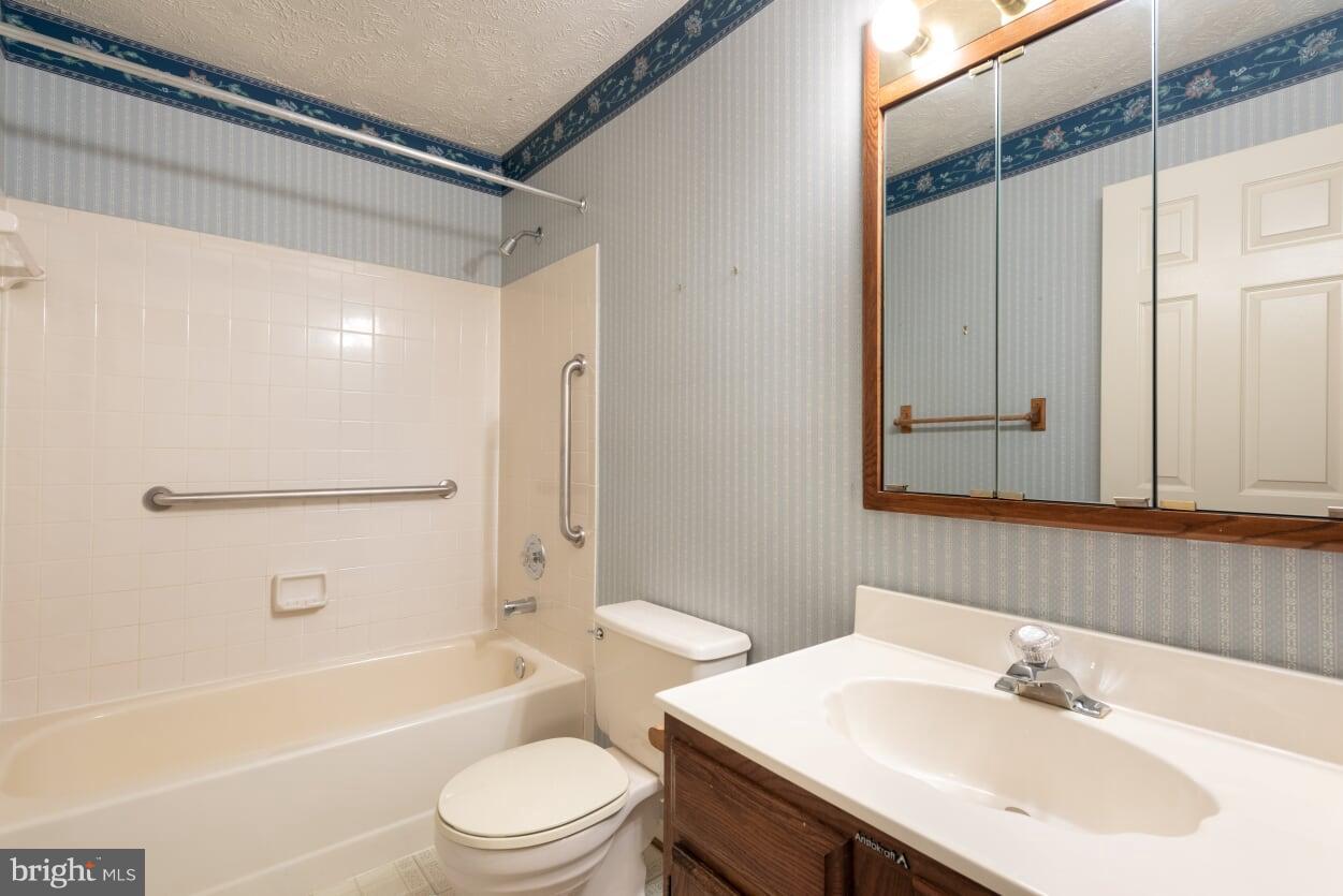 2216 Halter Lane Reston, VA 20191 - Photo 11 of 23 a bathroom with a sink toilet and shower