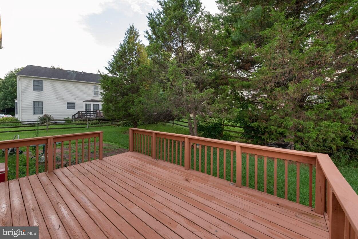 2216 Halter Lane Reston, VA 20191 - Photo 21 of 23 a view of balcony with wooden floor and fence