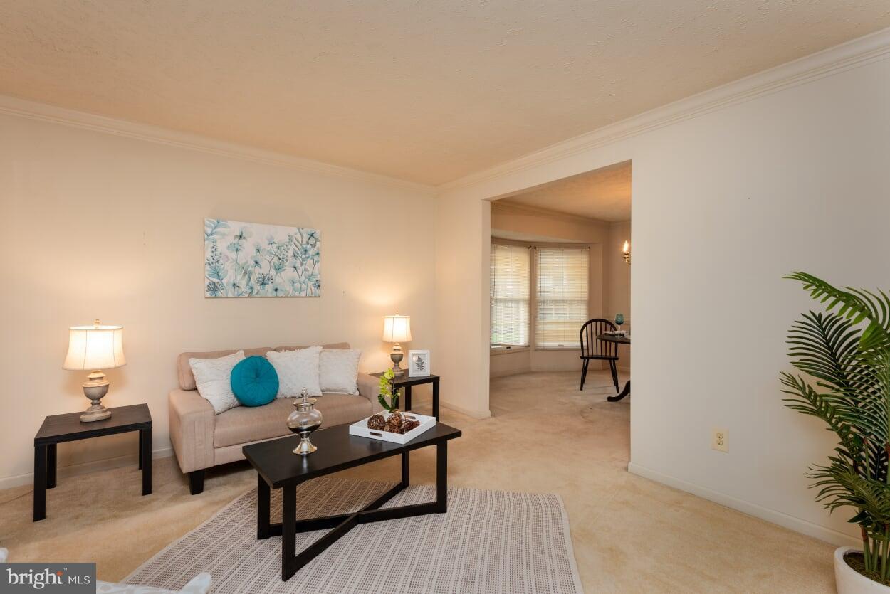 2216 Halter Lane Reston, VA 20191 - Photo 3 of 23 a living room with furniture and a lamp