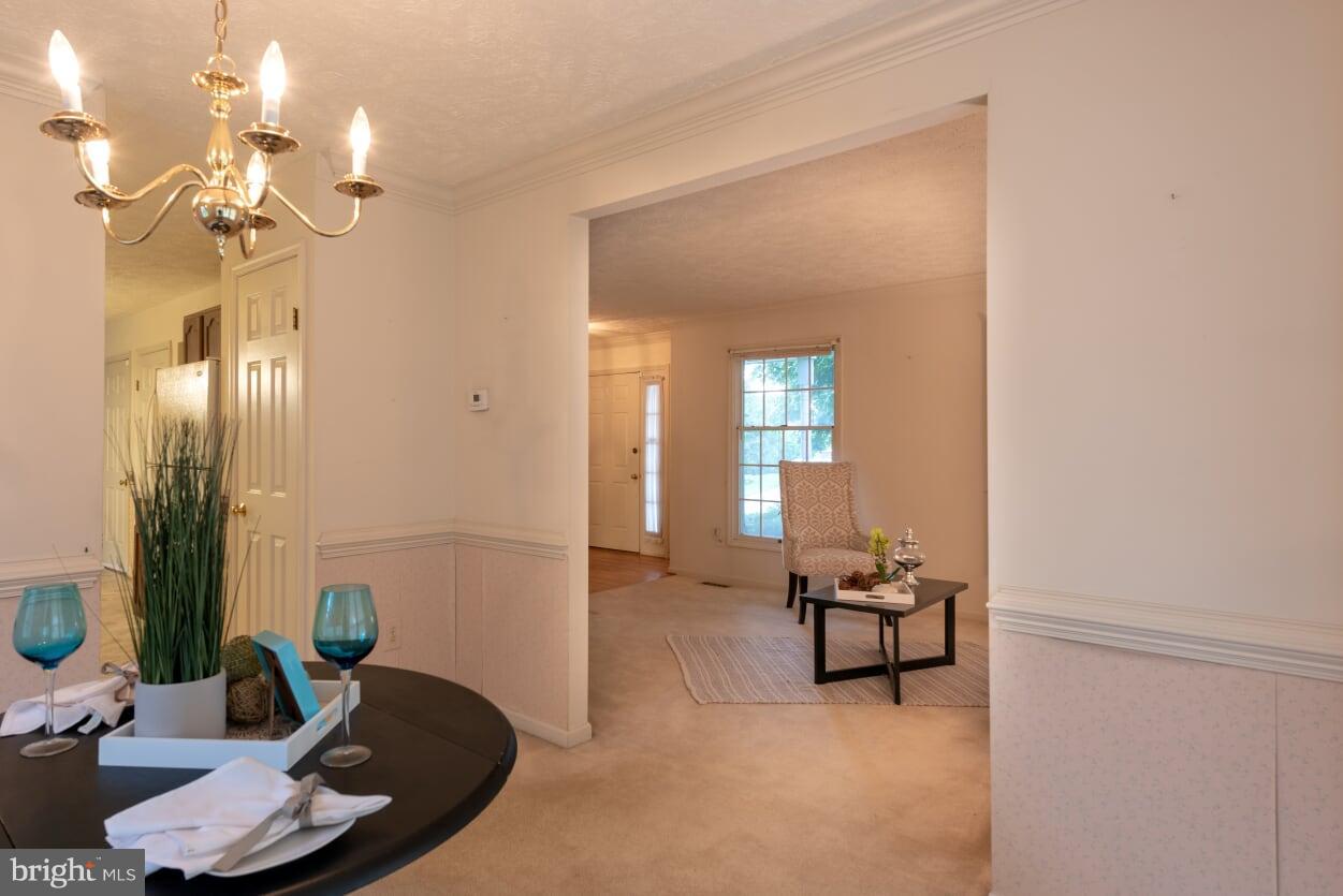 2216 Halter Lane Reston, VA 20191 - Photo 5 of 23 a living room with furniture and wooden floor