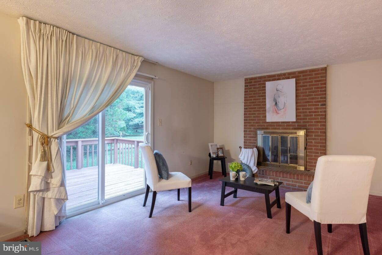 2216 Halter Lane Reston, VA 20191 - Photo 7 of 23 a living room with furniture and a window