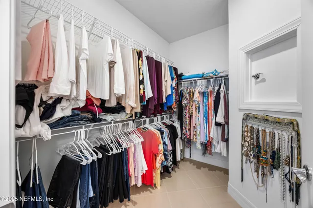 a view of a patio with a garden