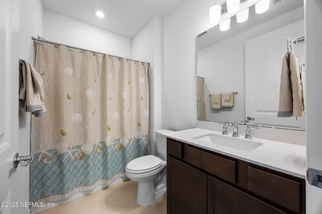 a view of a wrought iron fences in front of house