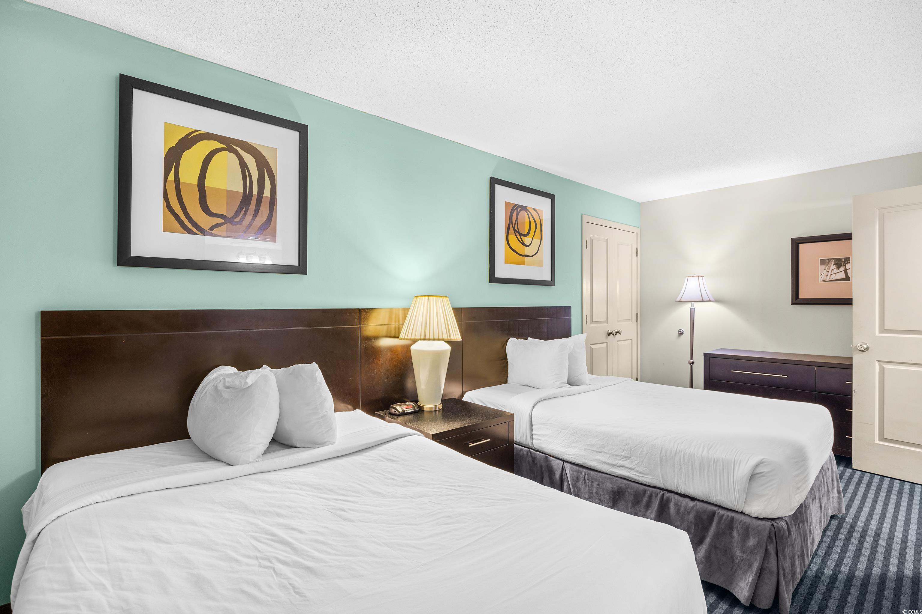 107 Ocean Boulevard, Unit 1402 Myrtle Beach, SC 29577 - Photo 16 of 38 Bedroom with carpet