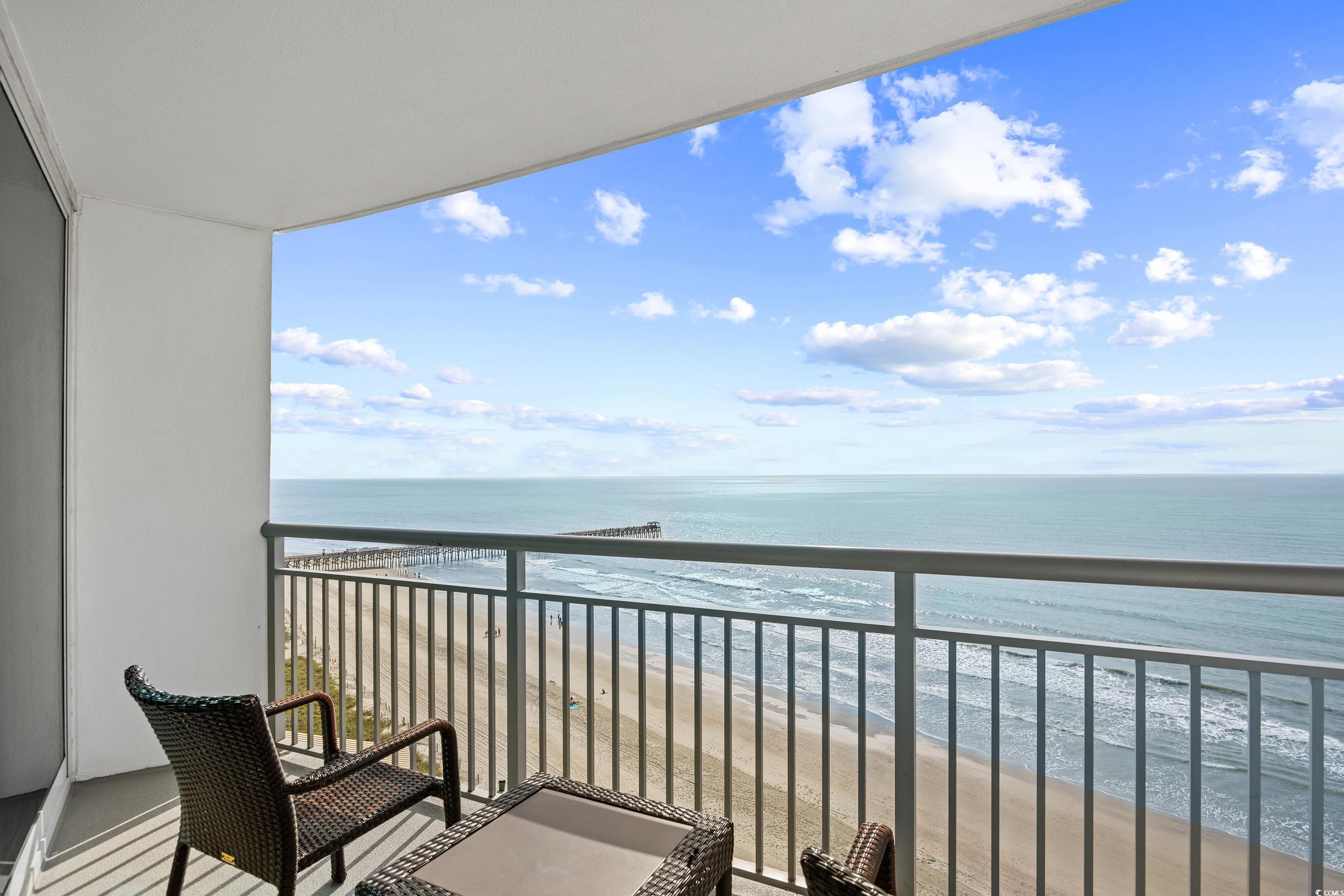 107 Ocean Boulevard, Unit 1402 Myrtle Beach, SC 29577 - Photo 27 of 38 Balcony with a water view and a view of the beach