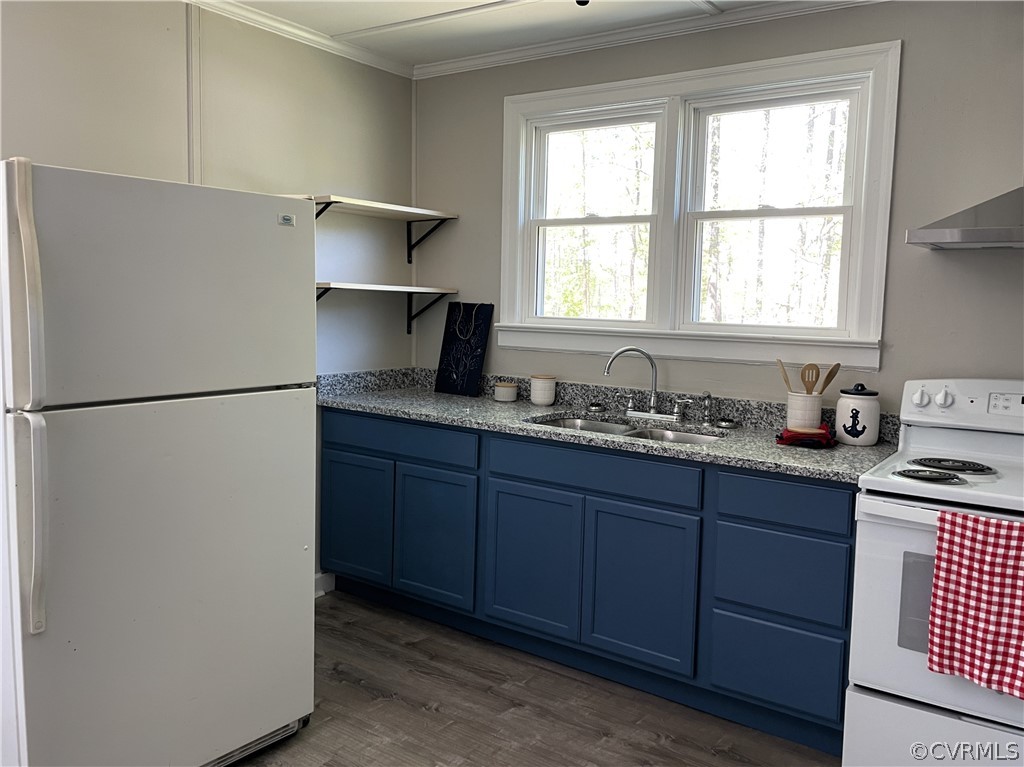 228 Beech Forest Road Kenbridge, VA 23944 - Photo 10 of 23 a kitchen with a sink a window and cabinets