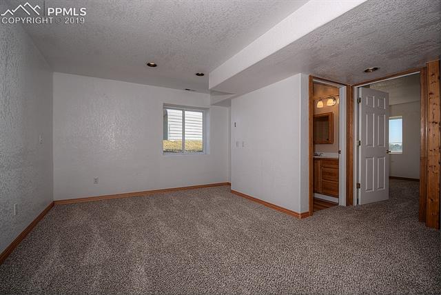 11625 Rex Road Peyton, CO 80831 - Photo 32 of 36 This area of the basement was formerly a wet bar and was removed while leaving the stubing for water hidden behind the dry wall