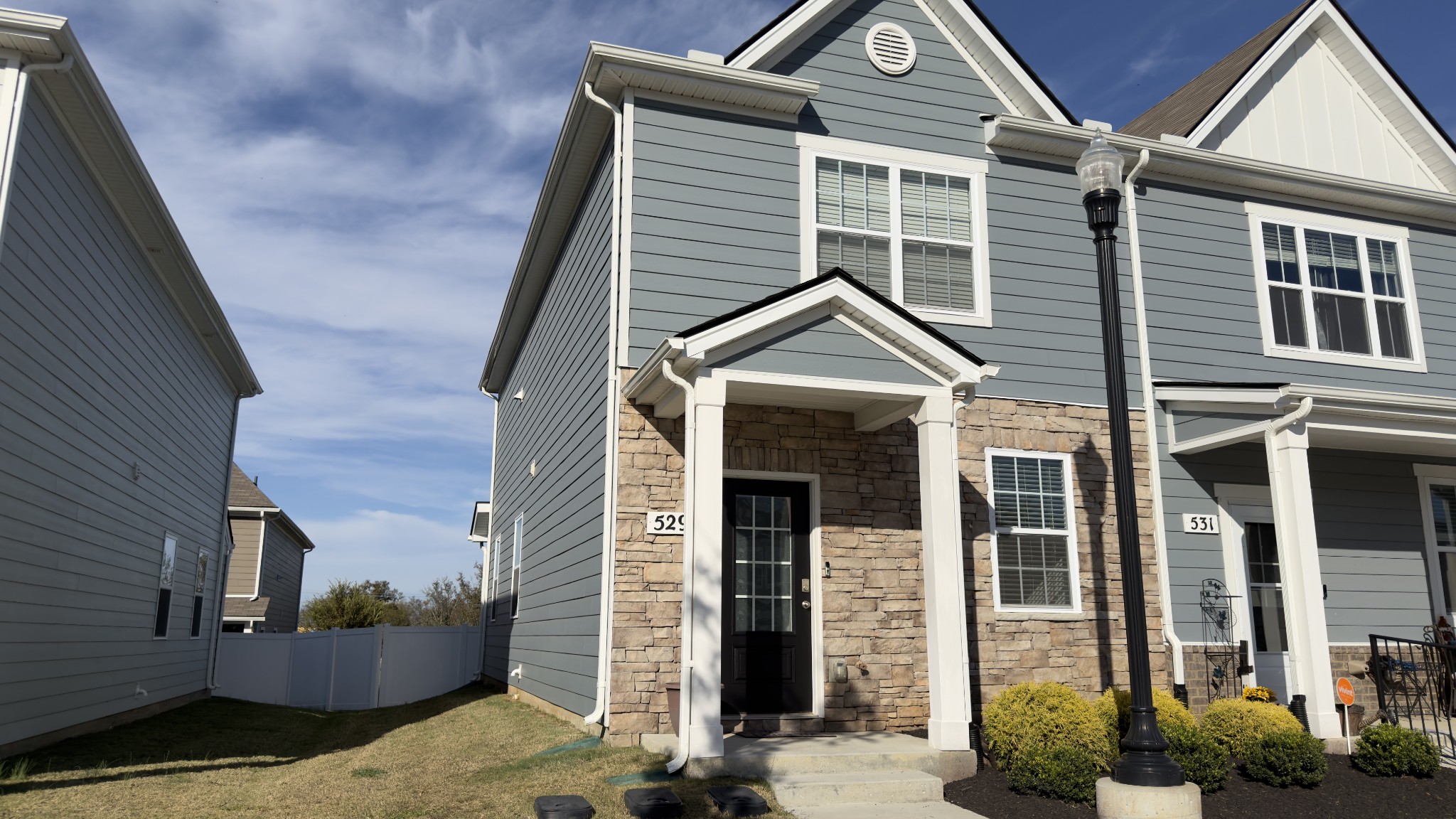 a front view of a house with street