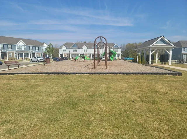 a view of pool and outdoor space