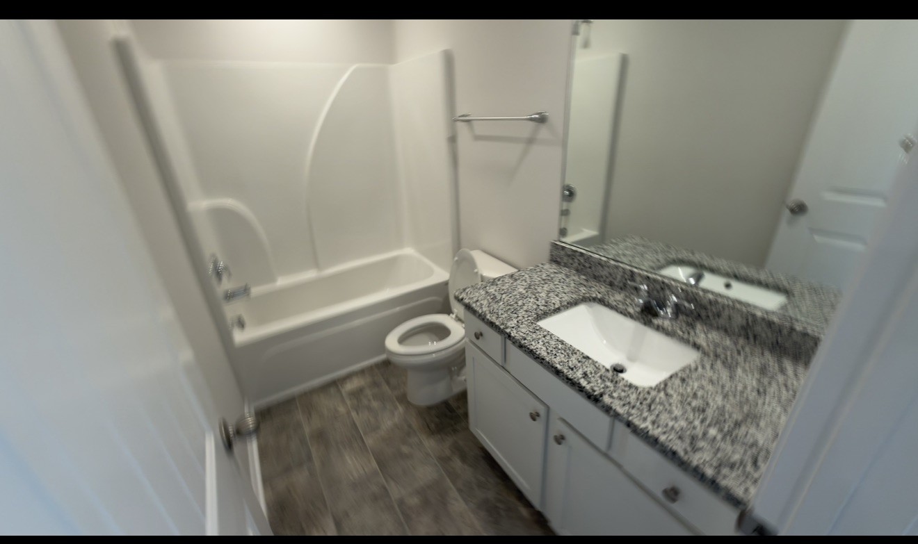 529 Ellen Road Lebanon, TN 37087 - Photo 14 of 17 a bathroom with a granite countertop sink toilet and shower