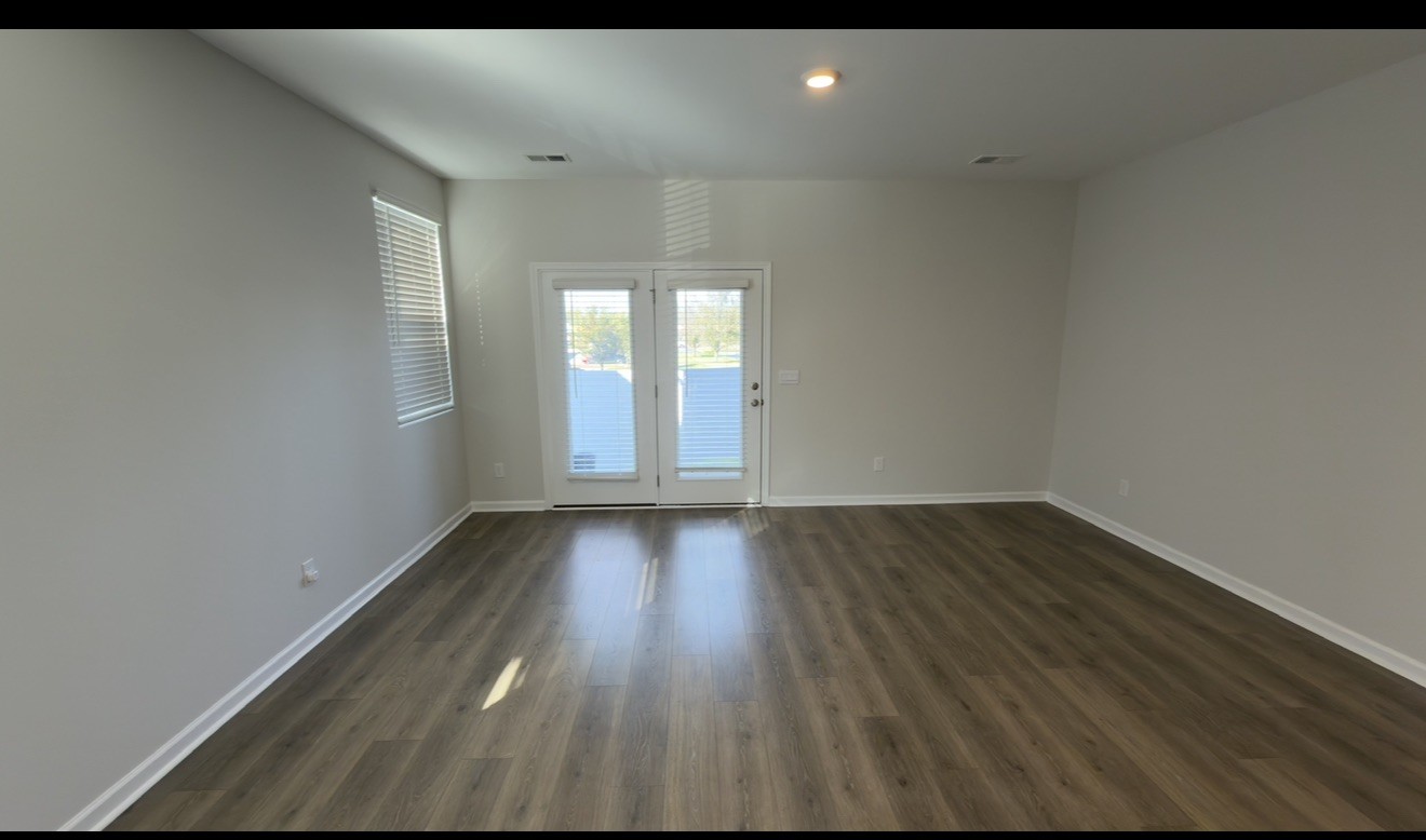 529 Ellen Road Lebanon, TN 37087 - Photo 4 of 17 a view of an empty room and wooden floor