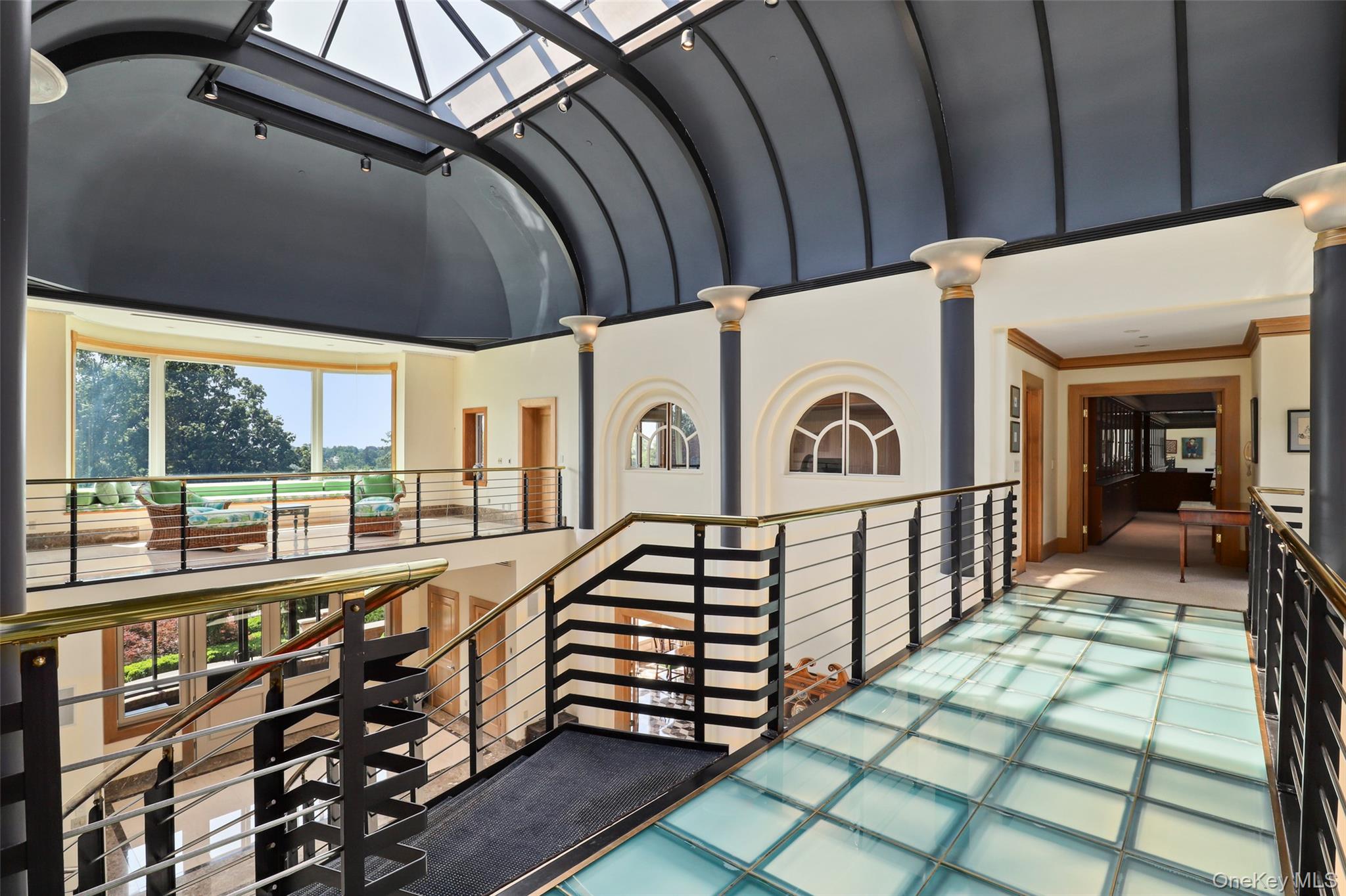 7 Rockledge Road Rye, NY 10580 - Photo 20 of 49 a view of a porch with wooden floor and iron stairs