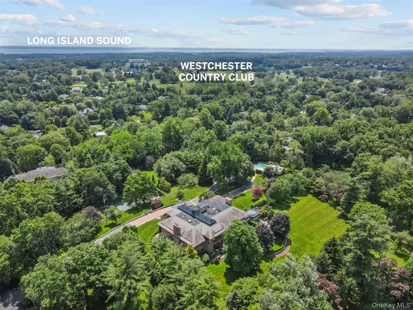 an aerial view of a house with a garden