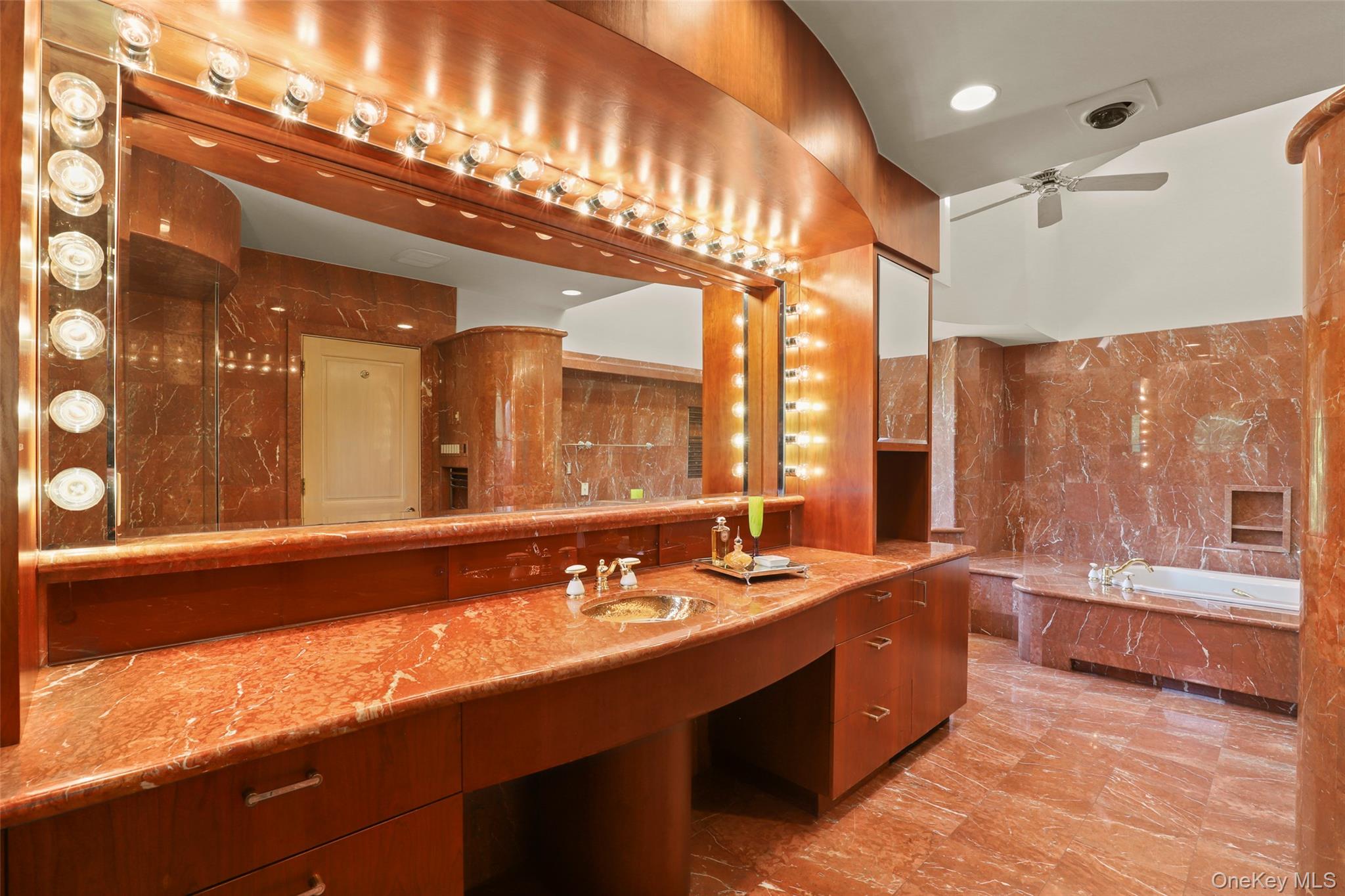 7 Rockledge Road Rye, NY 10580 - Photo 24 of 49 a large bathroom with a large tub sink and double vanity