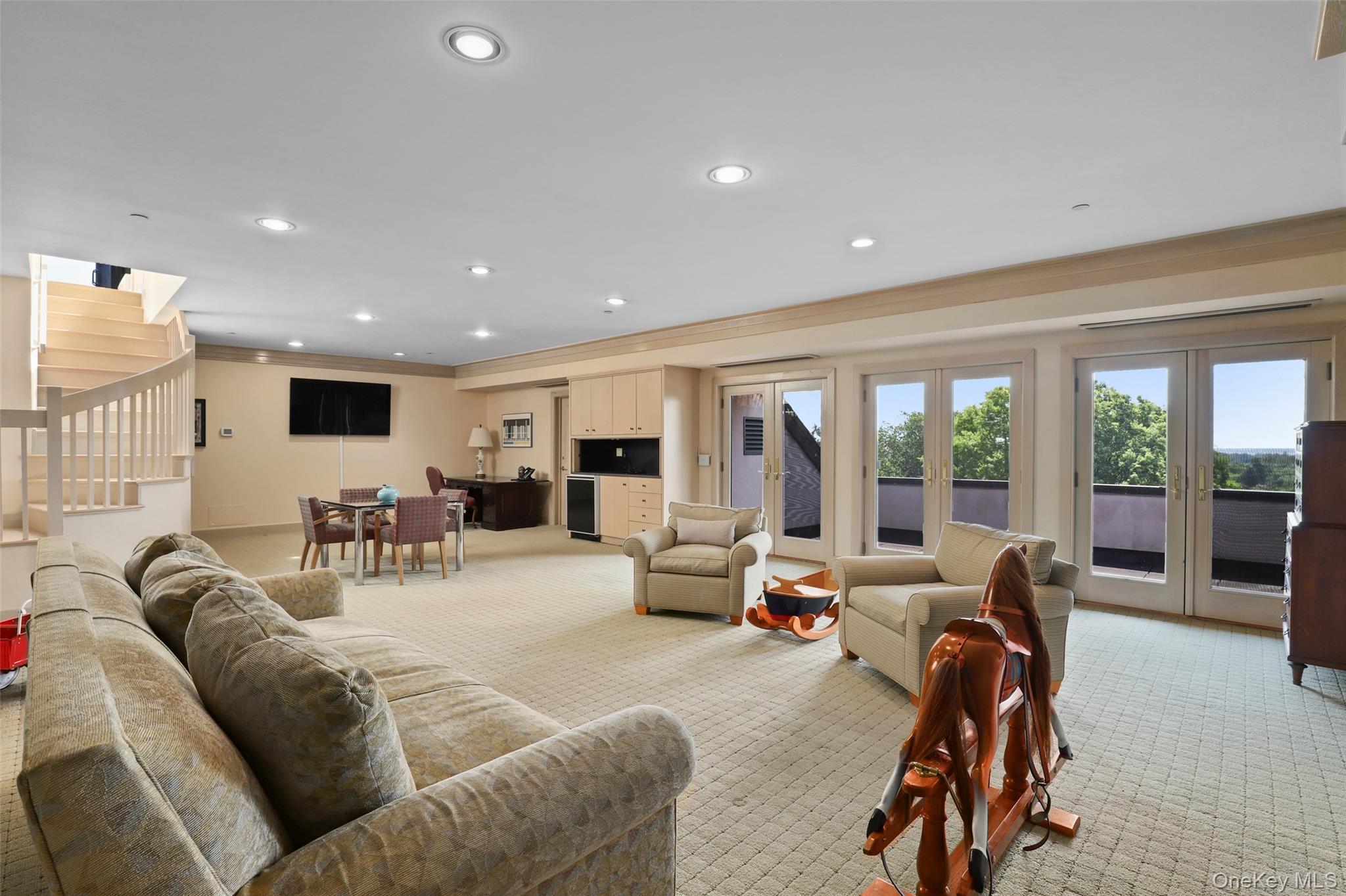 7 Rockledge Road Rye, NY 10580 - Photo 30 of 49 a living room with furniture and large windows