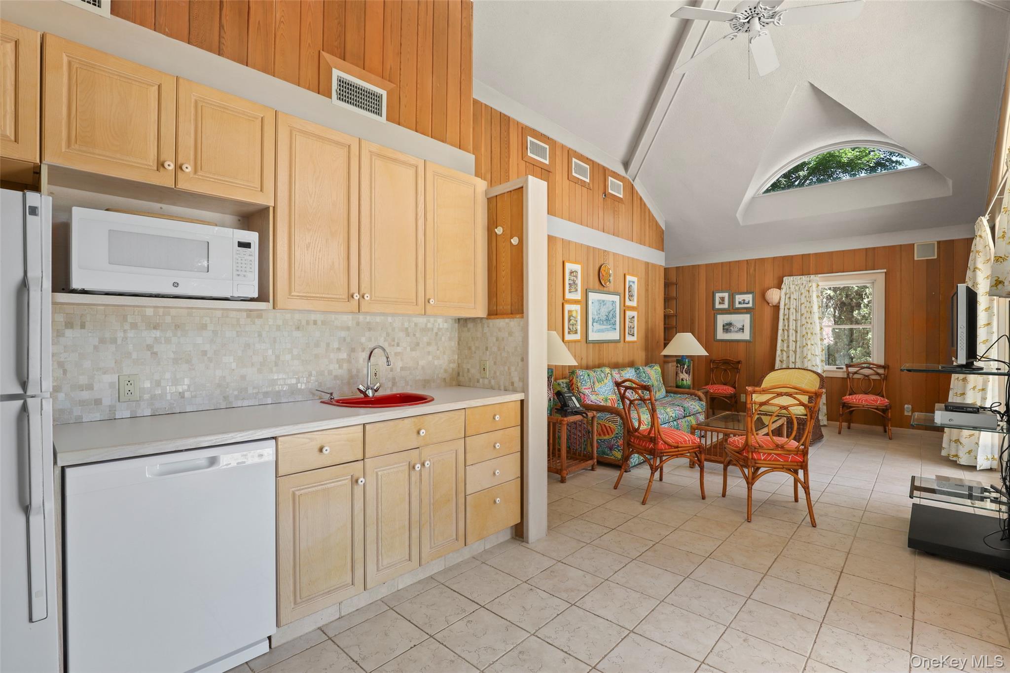 7 Rockledge Road Rye, NY 10580 - Photo 42 of 49 a living room with furniture a dining table and chairs with wooden floor