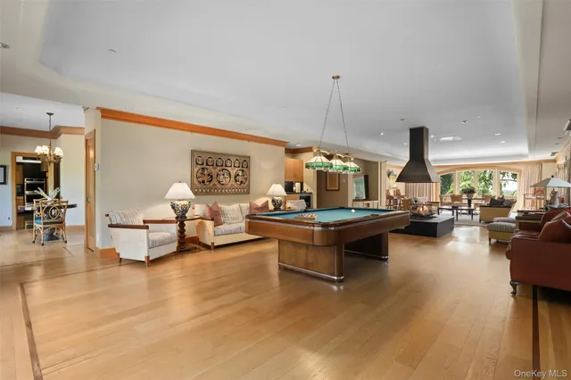 a large bathroom with a large tub sink and double vanity