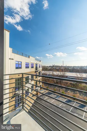 a view of a balcony with city view