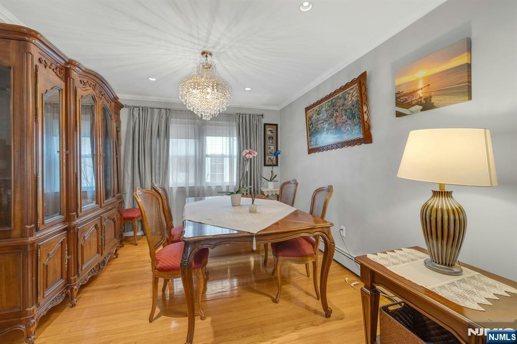 24 Cambridge Road Tenafly, NJ 07670 - Photo 13 of 31 a view of a a dining room with furniture window and wooden floor