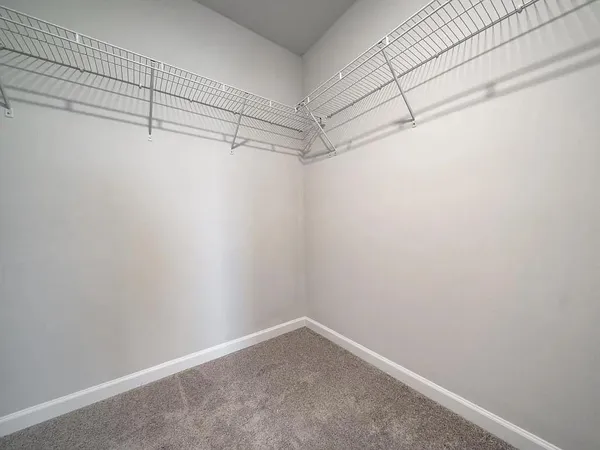 a view of a room with racks on the wall