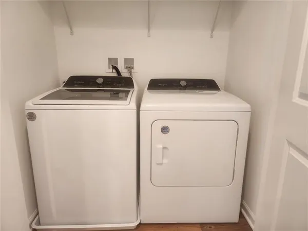 a bathroom with a shower and a toilet
