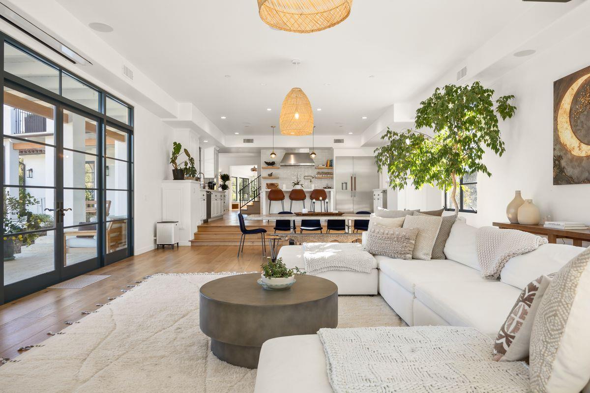 13202 Ojai Road Santa Paula, CA 93060 - Photo 11 of 50 a living room with furniture and a chandelier