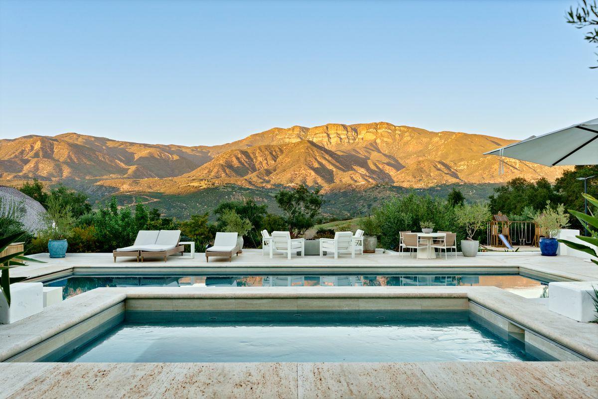13202 Ojai Road Santa Paula, CA 93060 - Photo 37 of 50 a view of a swimming pool with a lounge chair