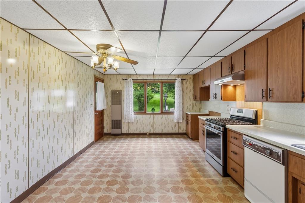 316 Orr Avenue Apollo, PA 15613 - Photo 8 of 47 a kitchen with stainless steel appliances granite countertop a refrigerator and a stove