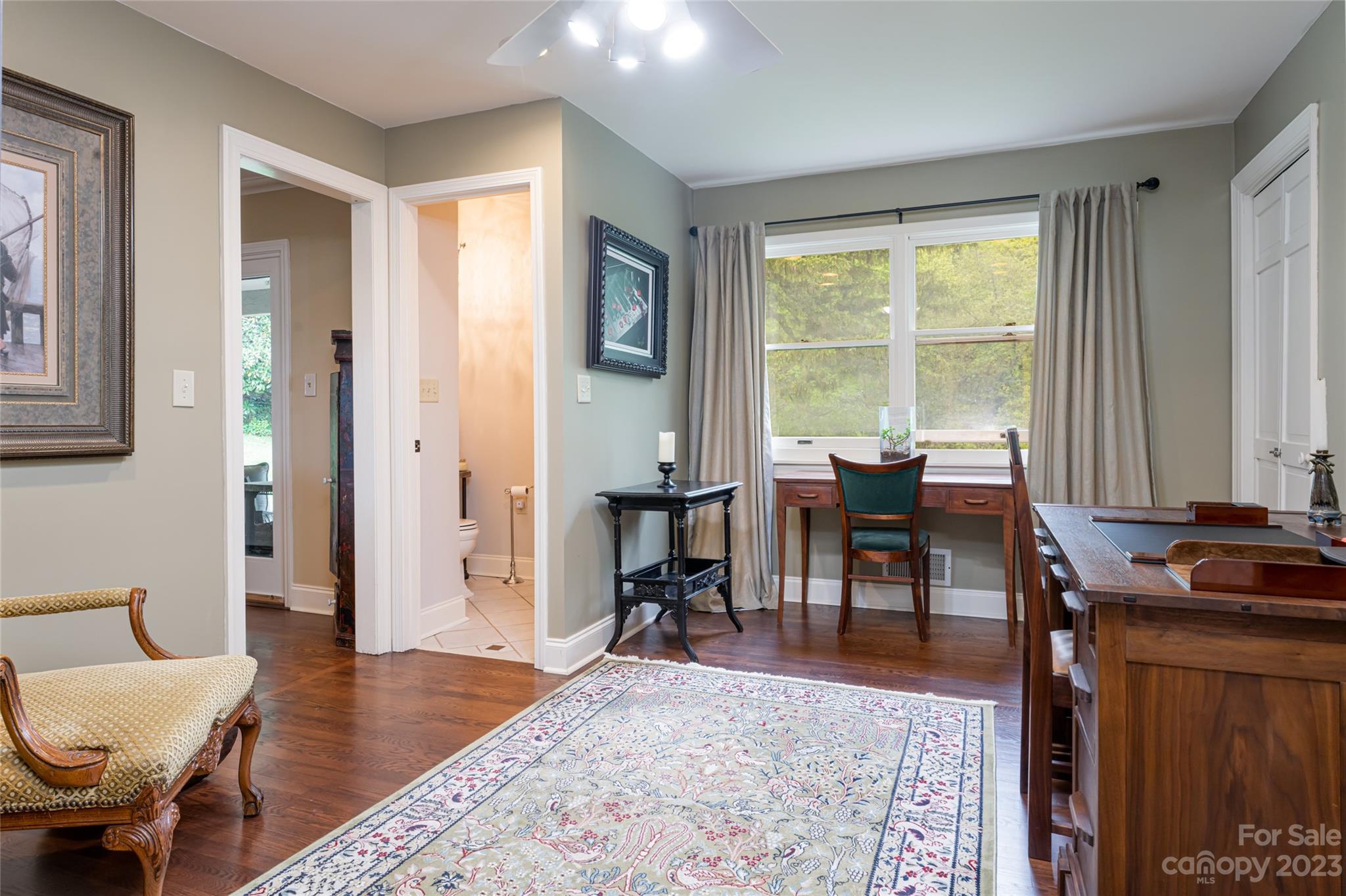 12 Club View Road Asheville, NC 28804 - Photo 19 of 47 a living room with furniture and a window