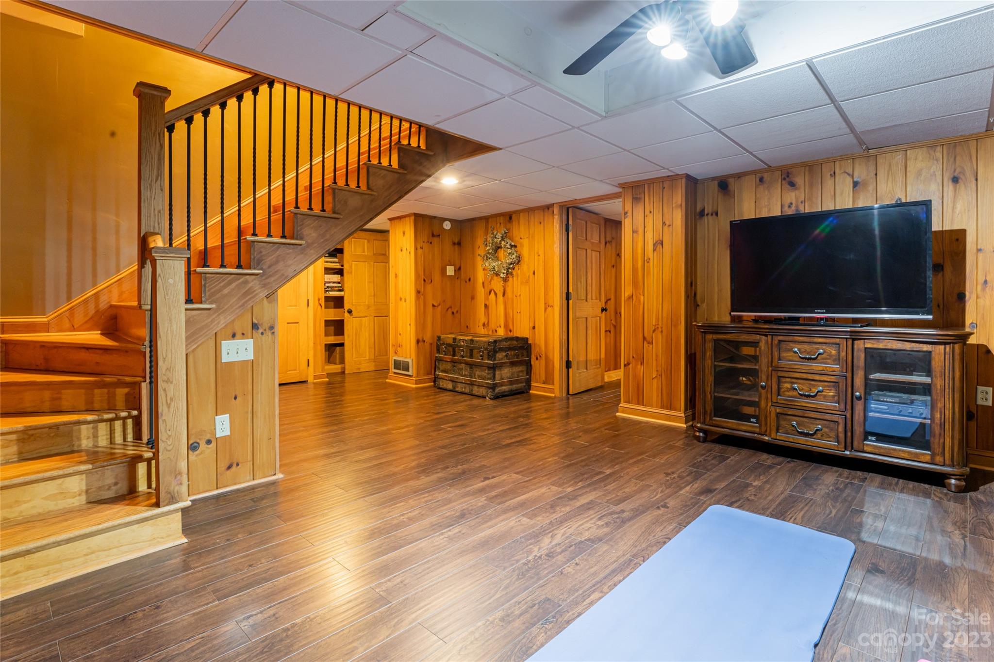 12 Club View Road Asheville, NC 28804 - Photo 29 of 47 a living room with furniture and a flat screen tv