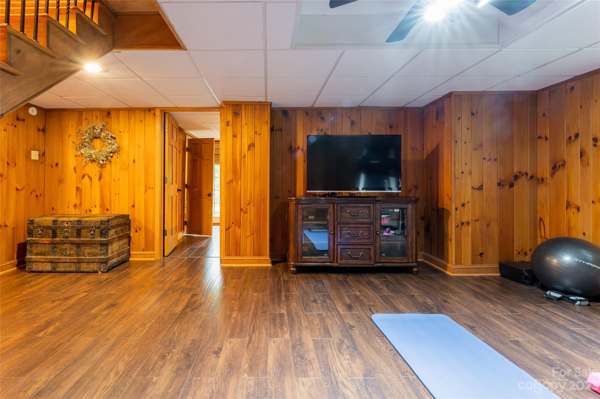 12 Club View Road Asheville, NC 28804 - Photo 32 of 47 a living room with furniture and a flat screen tv