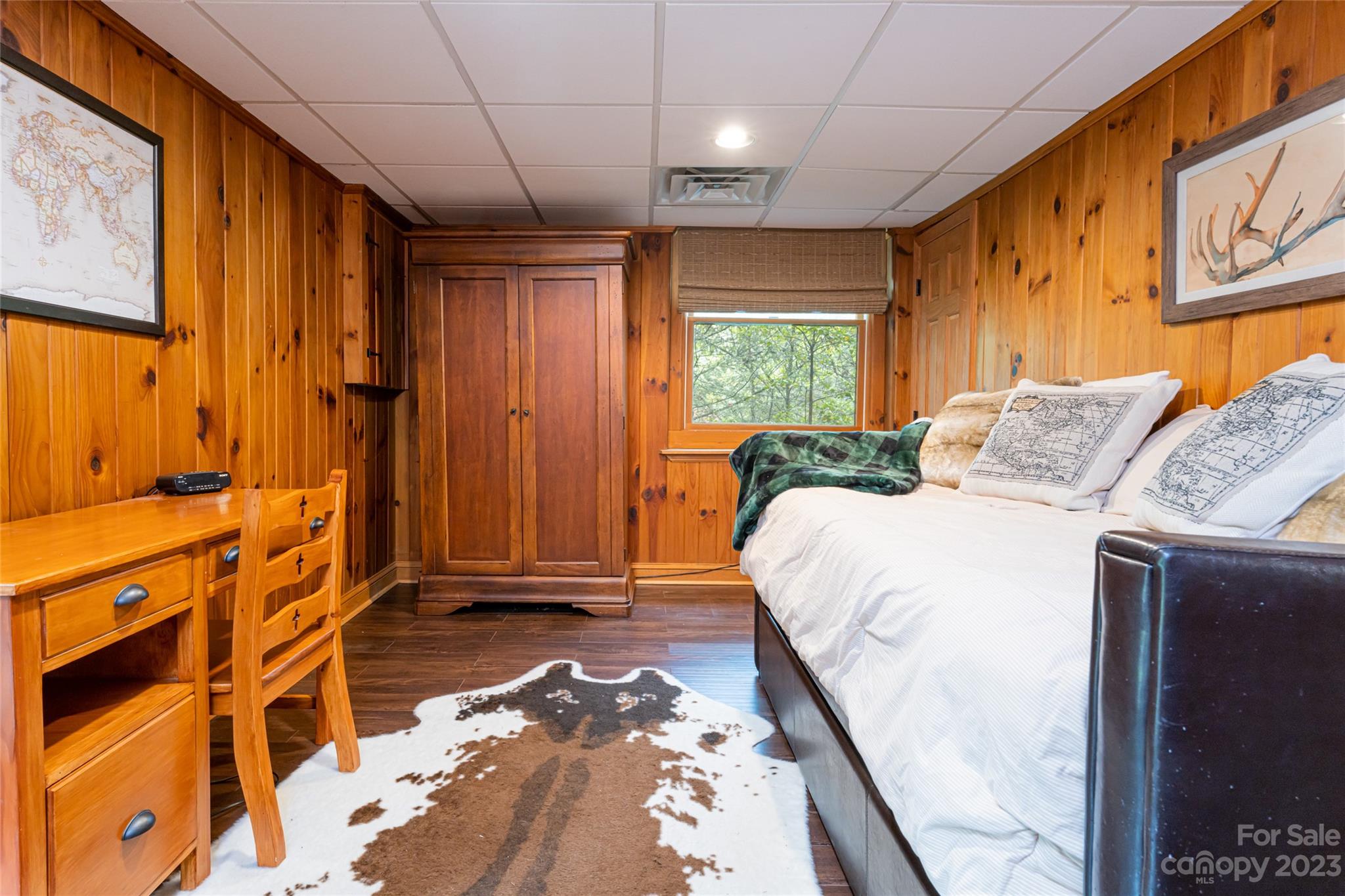 12 Club View Road Asheville, NC 28804 - Photo 33 of 47 a bed sitting in a spacious bedroom next to a window