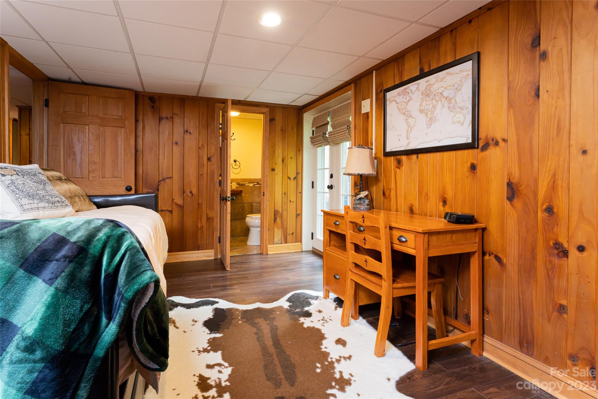 12 Club View Road Asheville, NC 28804 - Photo 34 of 47 a view of walk in closet with clothes and shoes