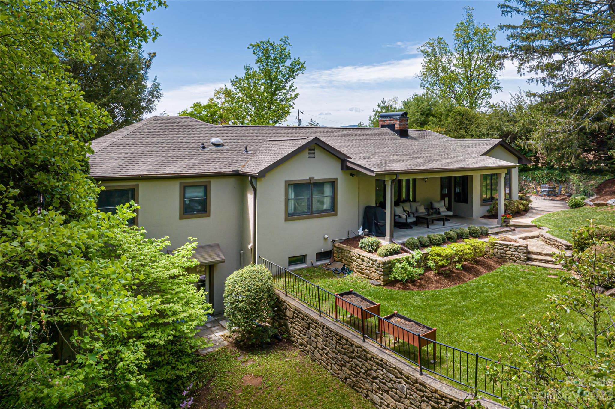 12 Club View Road Asheville, NC 28804 - Photo 37 of 47 a front view of house with yard outdoor seating and green space