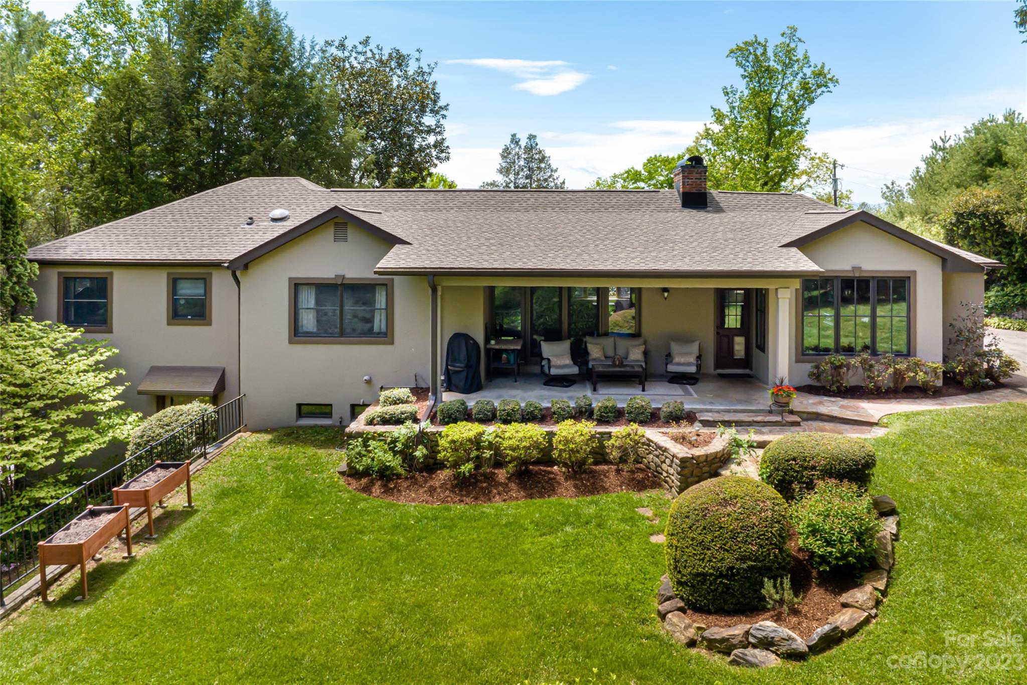 12 Club View Road Asheville, NC 28804 - Photo 38 of 47 a front view of a house with swimming pool having outdoor seating