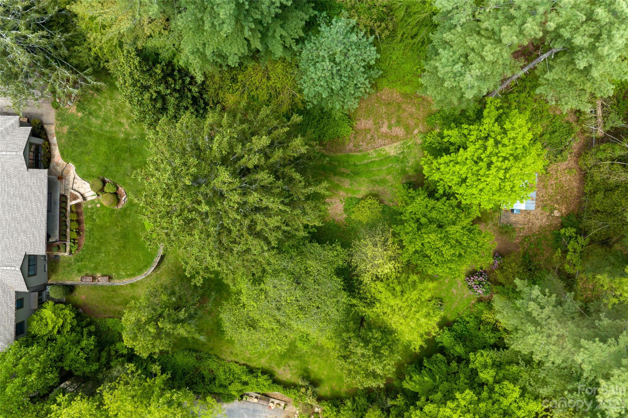12 Club View Road Asheville, NC 28804 - Photo 45 of 47 an aerial view of a house with a yard