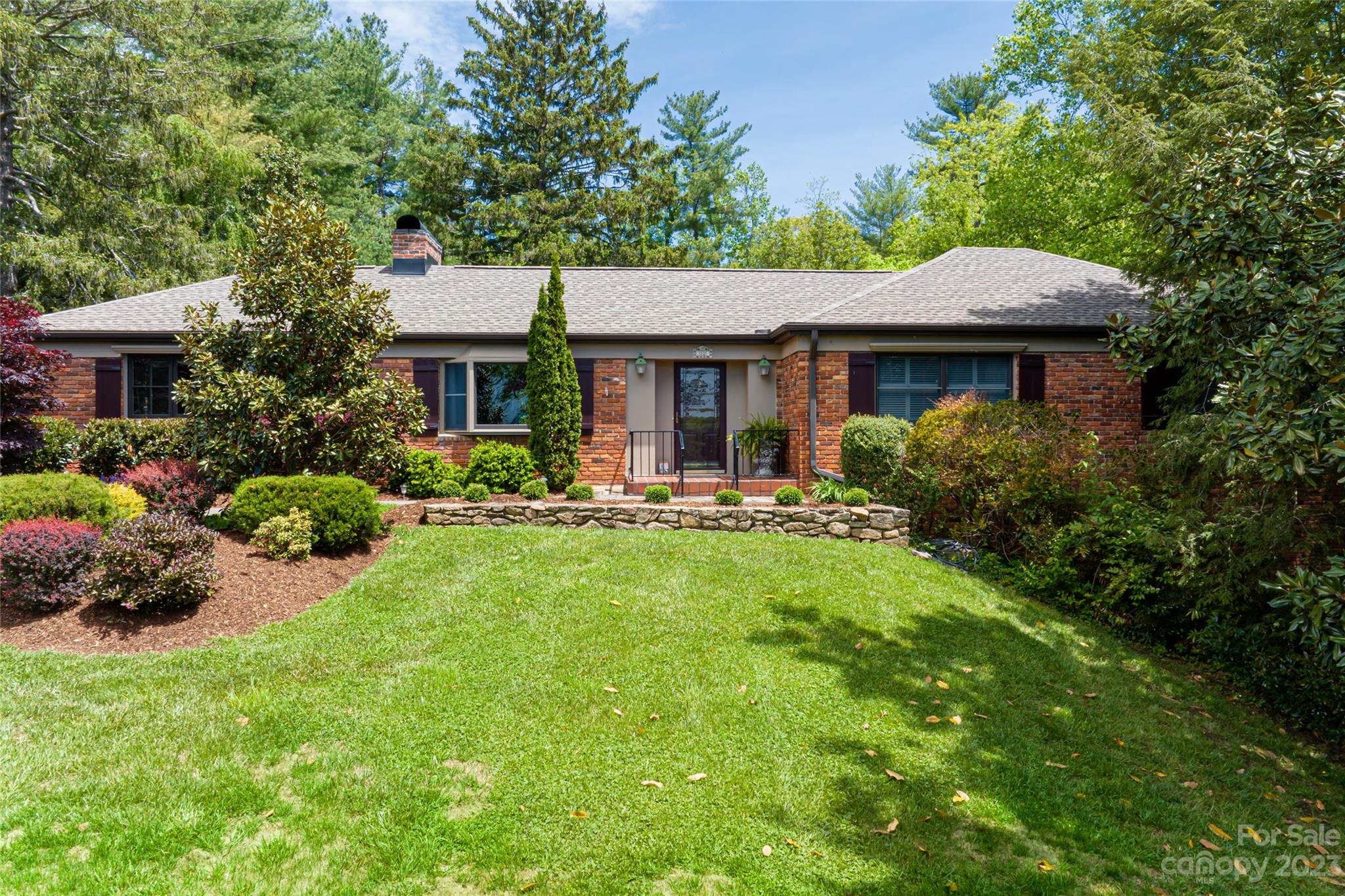 12 Club View Road Asheville, NC 28804 - Photo 47 of 47 a front view of house with yard and green space