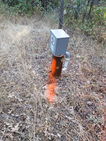 a small pool with a yard