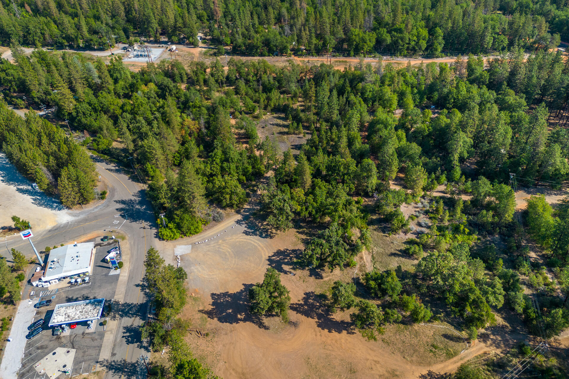 17 Acres In Lakehead Lakehead, CA 96051 - Photo 9 of 25 an aerial view of residential house with outdoor space and trees