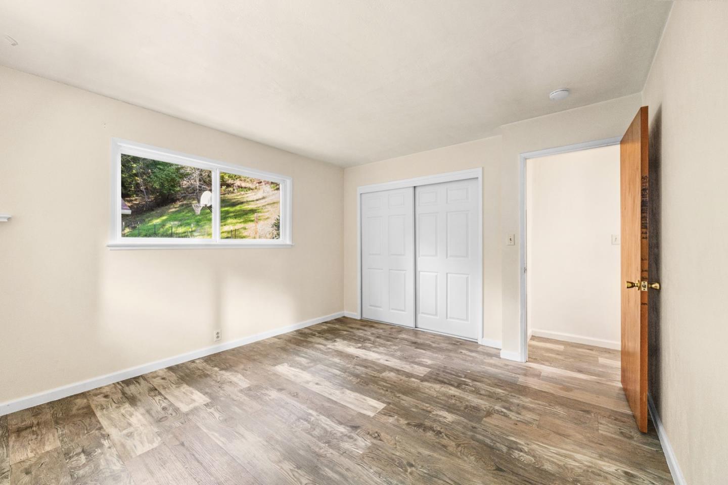 1000 Harmon Gulch Road Boulder Creek, CA 95006 - Photo 18 of 44 a view of an empty room with a window