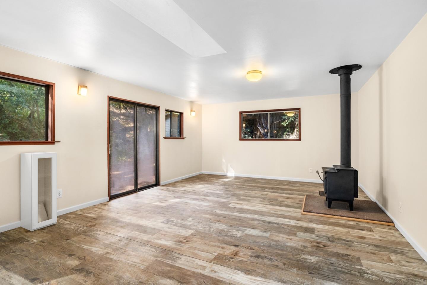 1000 Harmon Gulch Road Boulder Creek, CA 95006 - Photo 27 of 44 a view of an empty room with windows