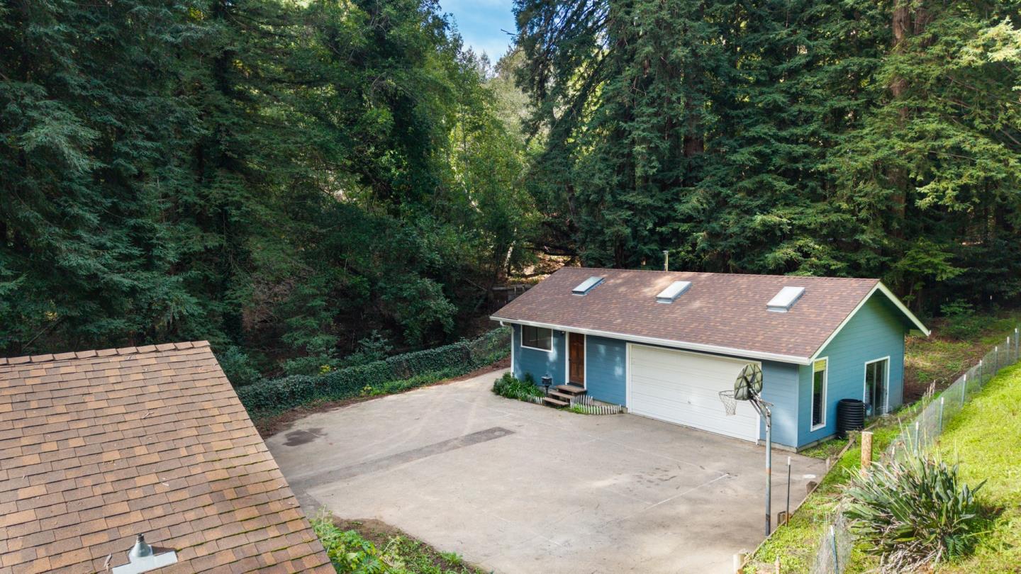 1000 Harmon Gulch Road Boulder Creek, CA 95006 - Photo 3 of 44 an aerial view of a house with a yard