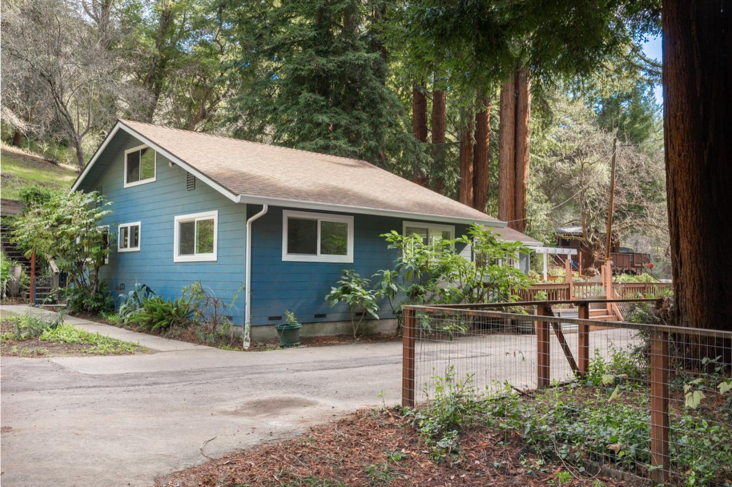1000 Harmon Gulch Road Boulder Creek, CA 95006 - Photo 41 of 44 a view of a house with backyard and garden