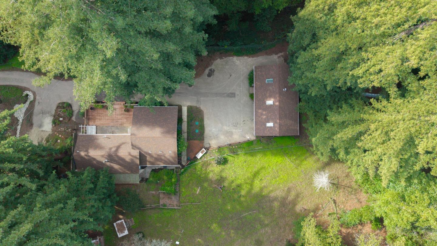 1000 Harmon Gulch Road Boulder Creek, CA 95006 - Photo 44 of 44 an aerial view of a house with pool yard outdoor seating and yard