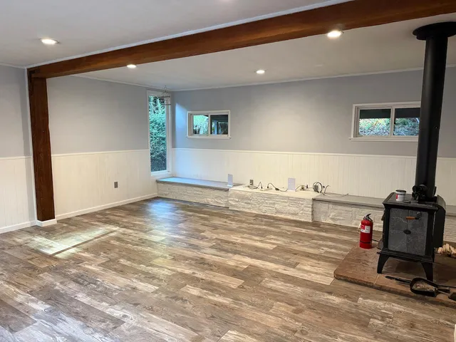 a view of a living room and workspace