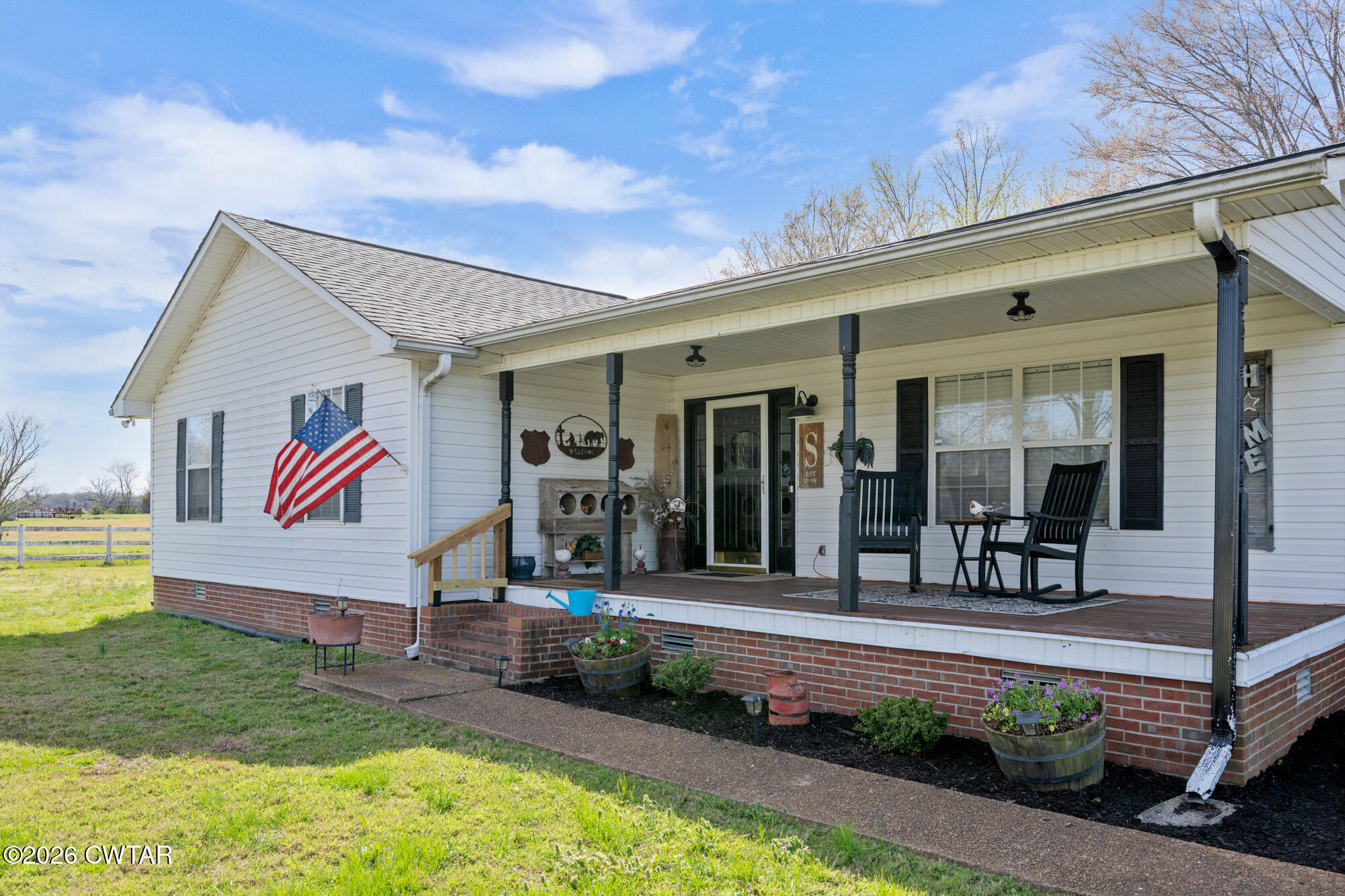 2250 Crucifer Road Huron, TN 38345 - Photo 1 of 32 a front view of a house with garden